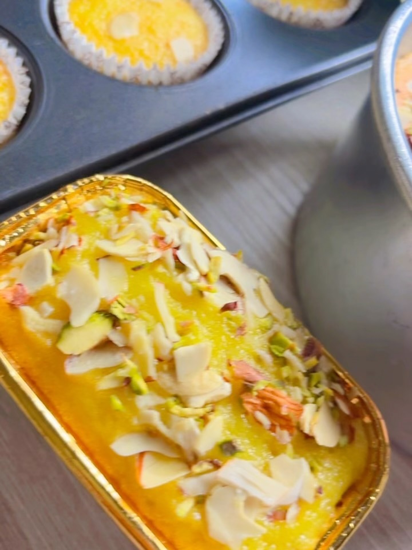 Mawa dry fruit tea cake topped with almonds and pistachios
